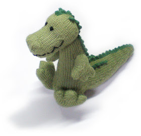 a knitted green cuddlesome crocodile called magda