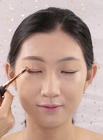 A little of caramelized on outer corner of eyes.