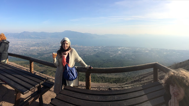 Enjoying a glass of Lacryma Christi white wine on the top of mount Vesuvius, Naples, Campania, Italy