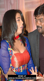 Priyamani in low neck dress