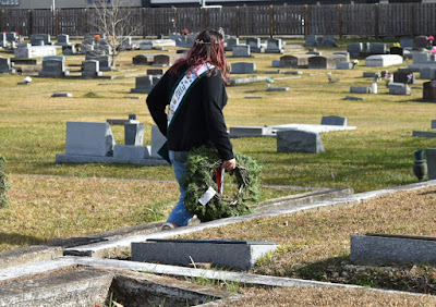 carrying wreaths