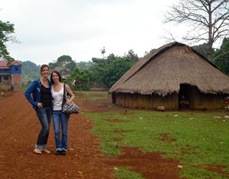 4521059-Standing_near_a_traditional_Pnong_Hut-Mondol_Kiri