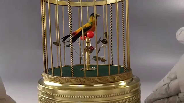 Mechanical Birds In Cage