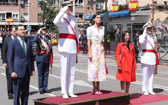 Queen letizia wore a new floral print midi skirt by Jose Hidalgo, and a white silk blouse Jose Hidalgo