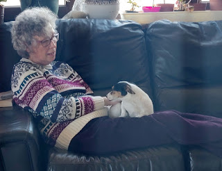 My mum getting a cuddle with Louise