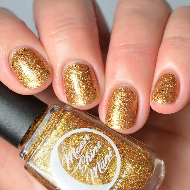 gold glitter nail polish swatch