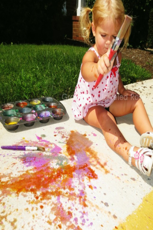 Paint the town this summer with fizzing sidewalk paint!  This easy recipe will keep the kids playing for hours! ##chalkpaintrecipe #sidewalkchalkart #sidewalkchalk #sidewalkchalkideas #chalkart #chalkpaint #chalkrecipe #chalkrecipesforkids #growingajeweledrose