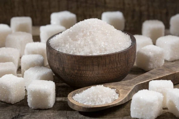 White refined sugar-powder and cubes.