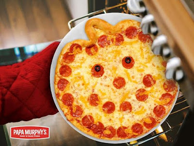 Papa Murphy's Jack-O Pizza coming out of the oven.