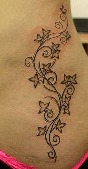 flower hip tattoo