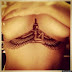 CHECK OUT RIHANNA'S NEW TATOO BELOW HER BREASTS (PHOTO INSIDE)