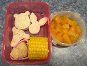 She chose Tigger, Pooh and Piglet mini cream cheese and strawberry jelly .