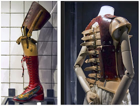 old fashioned prosthetic leg with ornate boot and back brace made of leather and multiple buckles