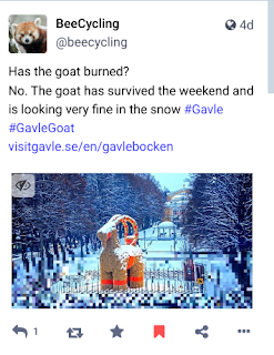 Screen grab of a toot that includes an image of the Gavle Goat - a large straw goat with red trims, erected in a public space in Gavle, Sweden.