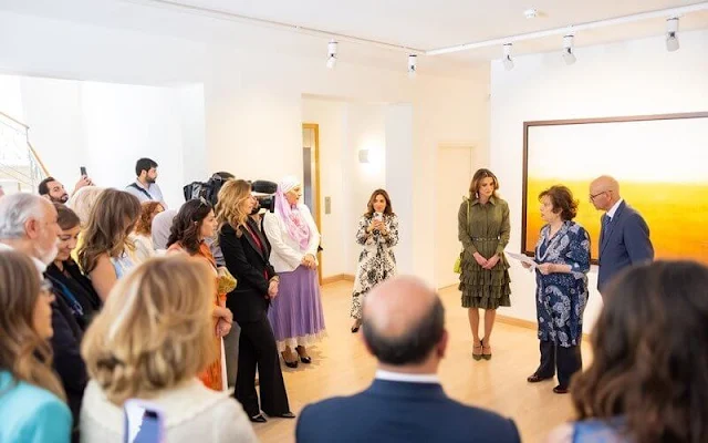 Queen Rania wore a new ruffle tiered long sleeve olive shirt dress Brandon Maxwell. Princess Wijdan