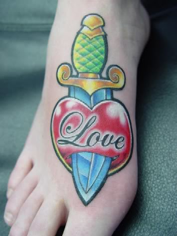 love heart tattoos on foot. Heart and dagger picture with