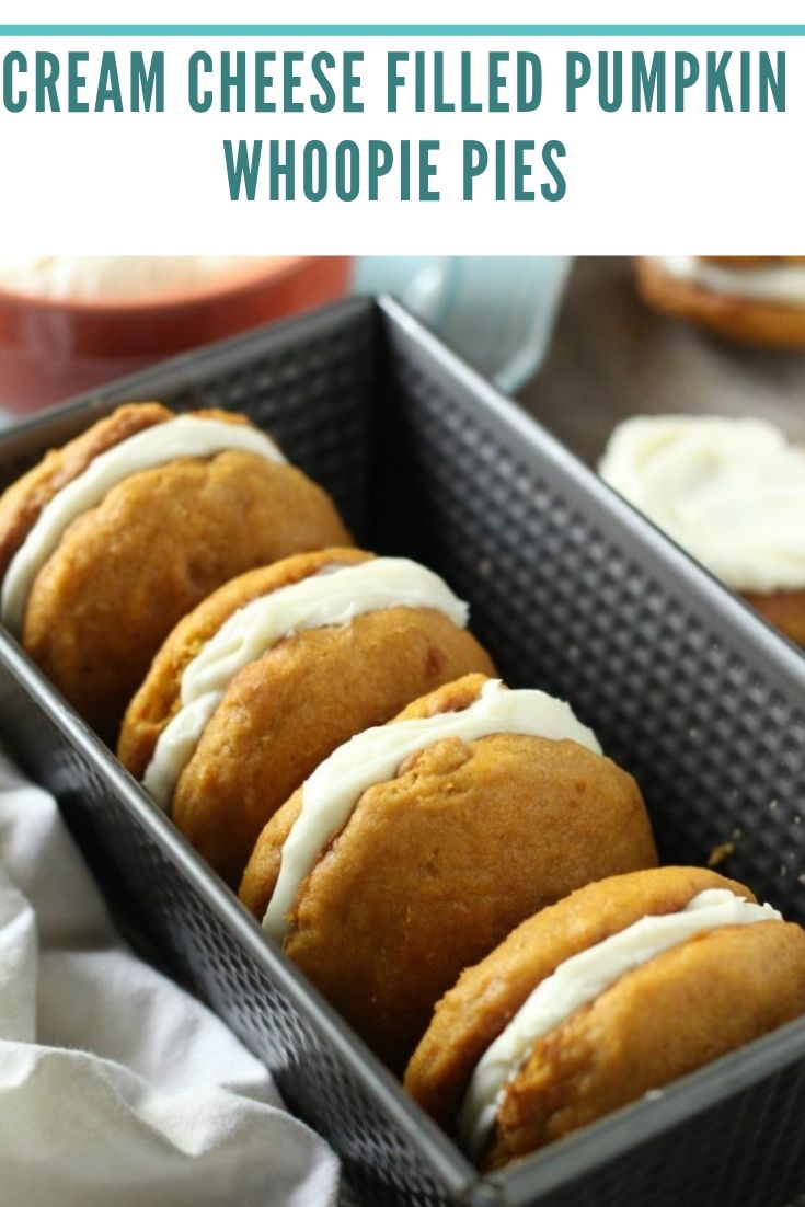 Thick, soft pumpkin cookies filled with tangy cream cheese frosting. Pumpkin Whoopie Pies | easy Thanksgiving dessert recipe | traditional pumpkin whoopie pies | cream cheese frosted pumpkin whoopie pies.
