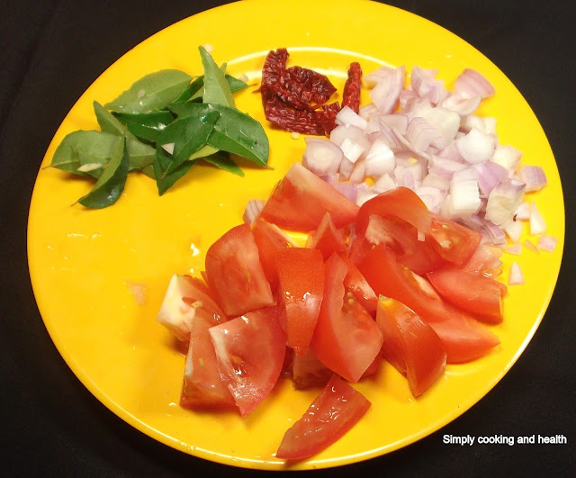 Tomato,curry leaves,onion and dry chili