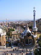 A gingerbread house is the gate to Gaudi's park rising in to the Barcelona . (fun )