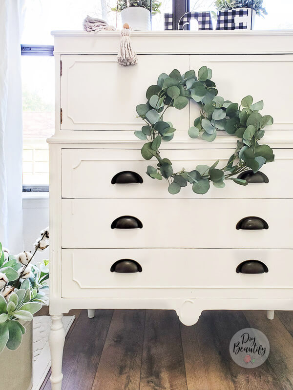white cottage dresser, eucalyptus heart wreath