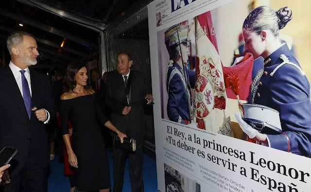 Queen Letizia wore a black dress. Pdpaola diamond pearls earrings, Aquazzura slingback pumps, Magrit clutch