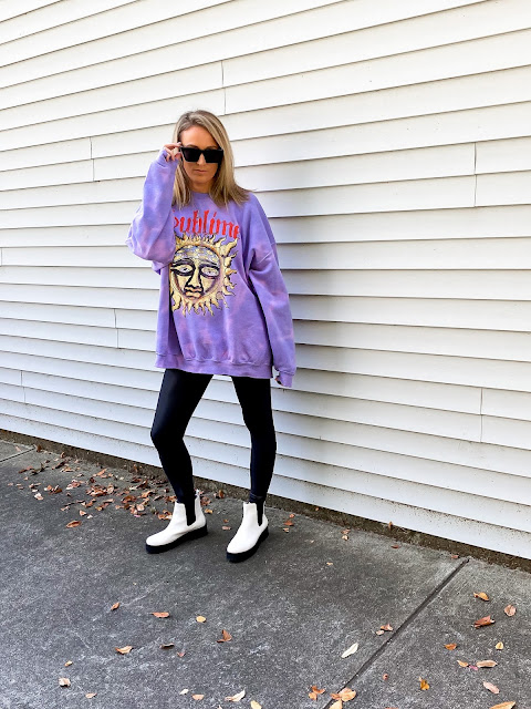 oversized sweatshirt with faux leather leggings and chelsea boots