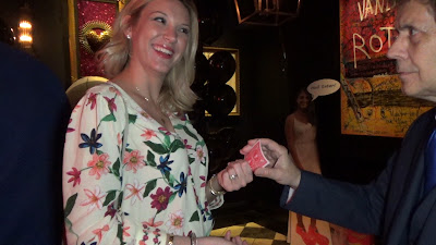 Image of a smiling spectator, after interacting with Massachusetss Magician Joe Ferranti.