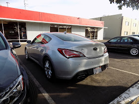 2014 Hyundai Genesis Coupe with damaged fender, door & quarter panel after collision repairs at Almost Everything Auto Body