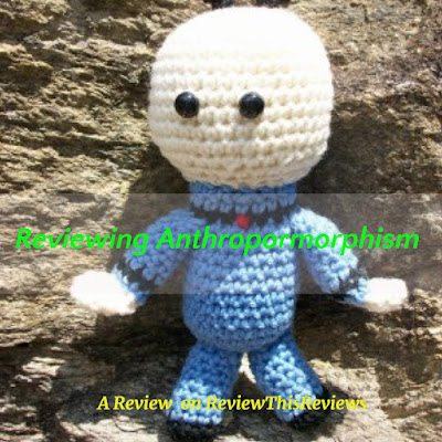 Image of a crocheted  alien doll