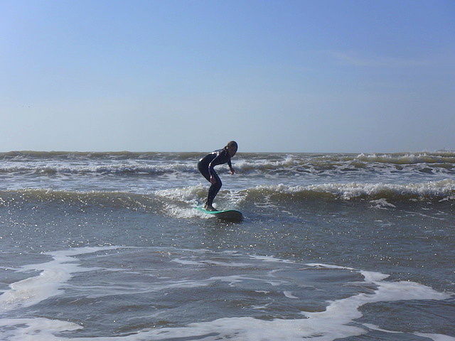 Surfing Essaouira beach, Morocco.