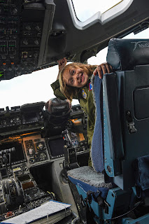 A military child participates in the Joint Base Lewis-McChord (JBLM) Pilot for a Day program. (Photo by U.S. Air Force Airman 1st Class Mikayla Heineck)