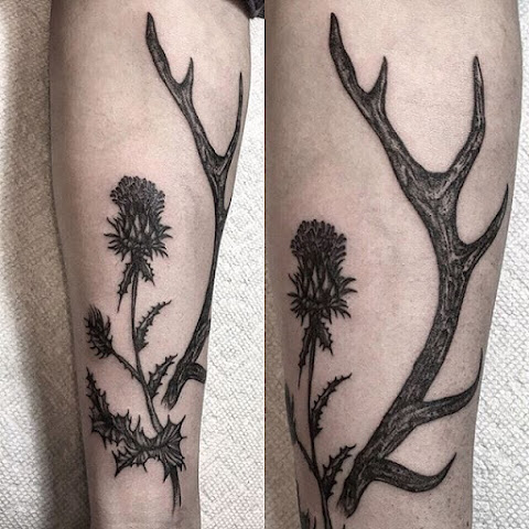 Out Of The Woods With These Lovely Antler Tattoos