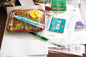 Messy desk, bento large enough for the entire day