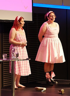 Lætitia and Karen on stage in Barbie outfits