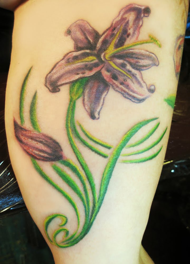 I always like flower tattoos Inside arm is always alittle bit of a pain 