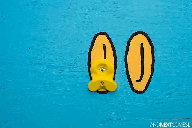 Close up of Super Mario themed DIY climbing wall for kids