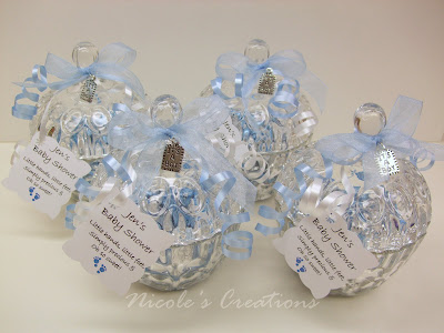 Decorated With Blue & White Ribbons & A Special 'It's a Boy' Metal Tag.