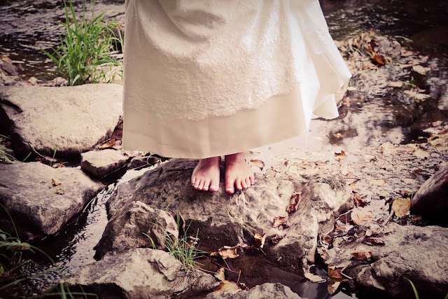 Bride's foot in a river