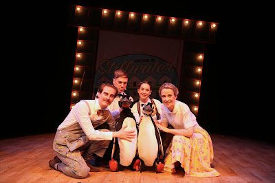 Cast of Mr Popper's Penguins with 2 puppet penguins
