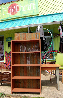 Shown at Hip Thrift, the wobbly bookcase is now solid as a rock and looking spiffy.