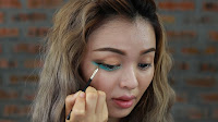 St. Patrick's Day Makeup - Put on some gel eyeliner on the lashline and wing it out above the green eye shadow to enhance the look