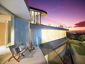 Modern house from the terrace at sunset