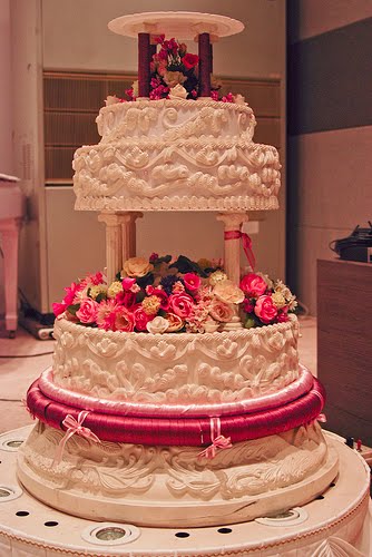 Indian Wedding Cake Decorated With Mahndi And Elephants Topper