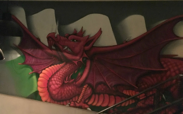 Jamie's Italian, Cardif.f Painting of a red dragon on a wall