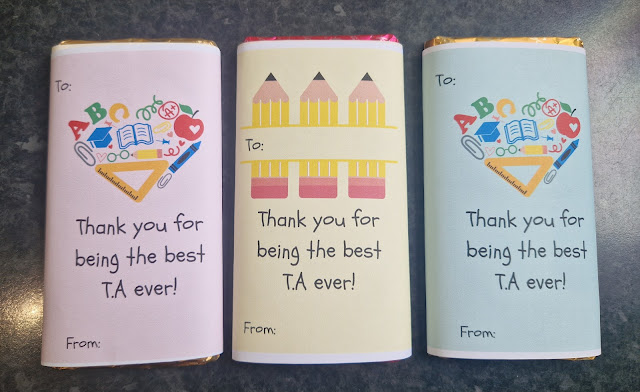 3 different Galaxy chocolate bars with teacher themed sleeves.