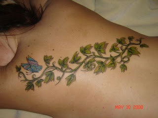 Flower Tattoo Design on Back Girl