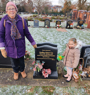 Grandma and Rosie by Grandad's grave