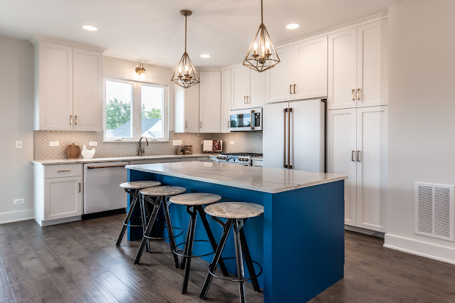 Kitchen with blue color island