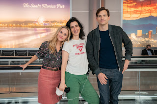 Your Place or Mine (2023). Reese Witherspoon as Debbie Dunn, Aline Brosh McKenna (Writer / Director) Ashton Kutcher as Peter. Cr. Erin Simkin / Netflix