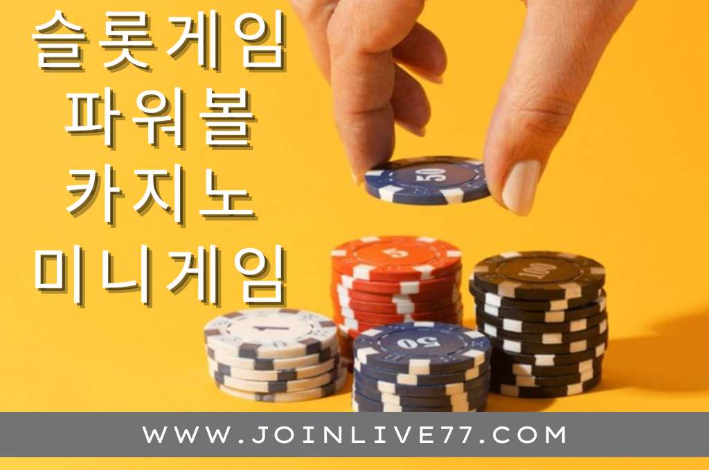 Poker chips hold by a hand in yellow background.